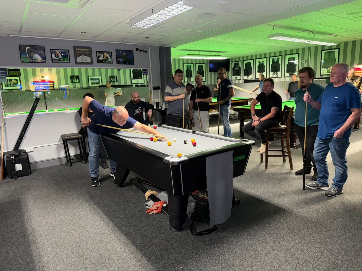 Members playing pool at JP's
